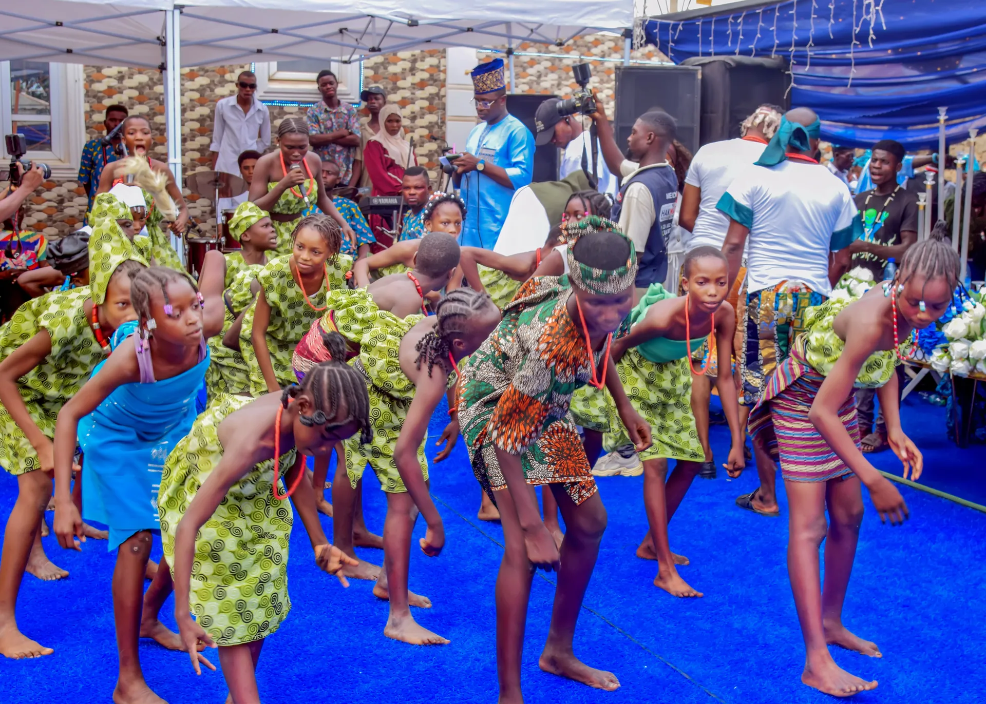 Children performing traditional dance at royal ceremony