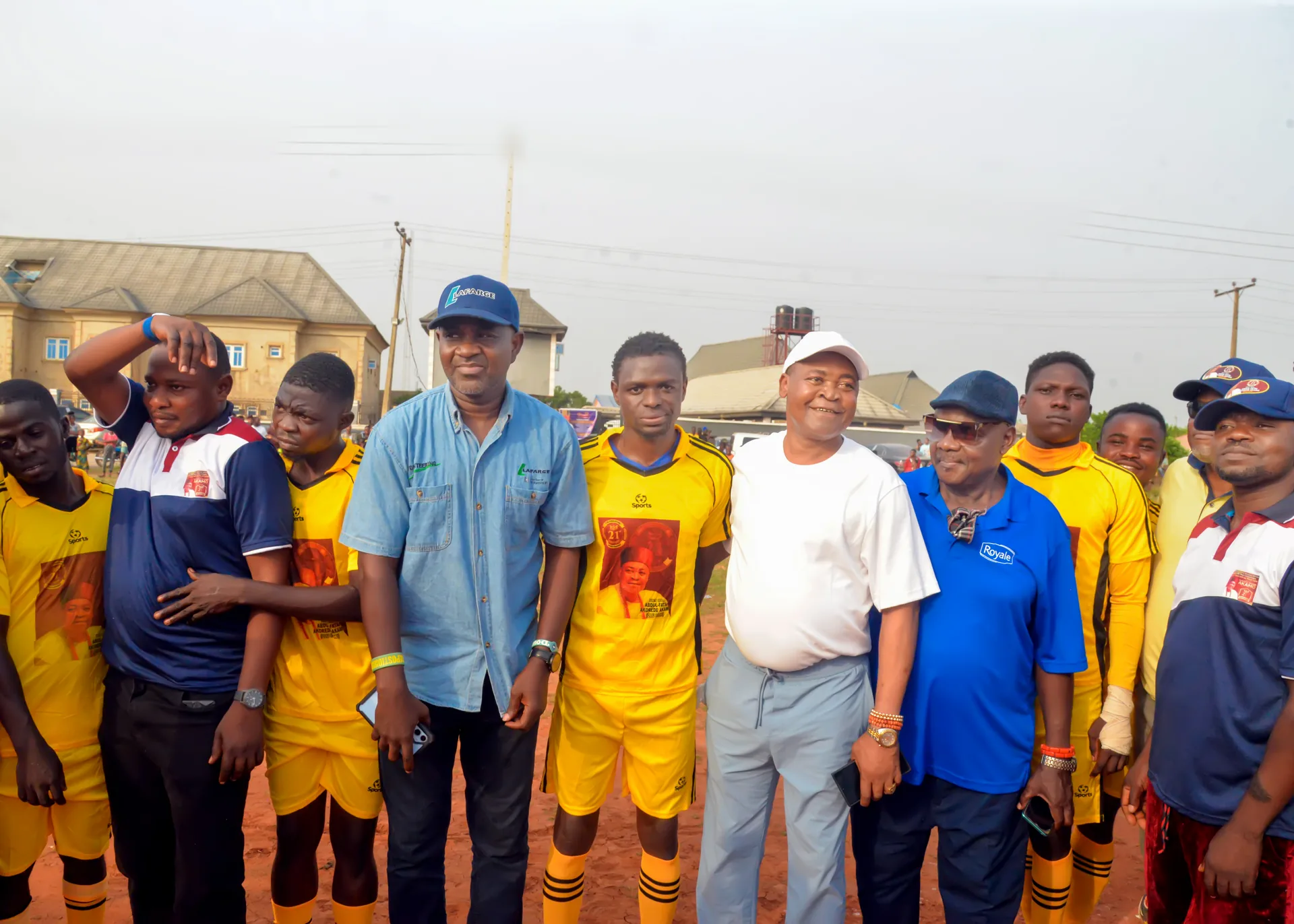His Royal Majesty with youth during football match and sports event